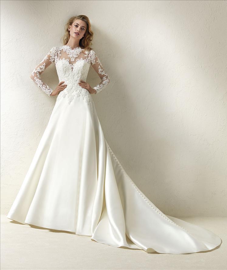 Abito Sposa Con Corpetto In Pizzo Manica Lunga In Trasparenza E Gonna In Mikado Mod Draga Linea Pronovias Favole Abiti Da Sposa E Da Cerimonia Con Sartoria